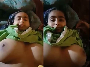 Married woman with large bosom of Pakistani descent performs sexual act on webcam