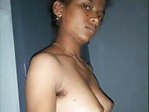 Pretty Indian woman engages in sexual activities including breast examination.